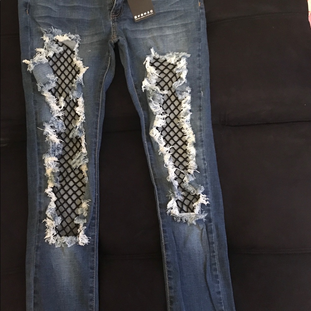 Fishnet distressed skinny jeans